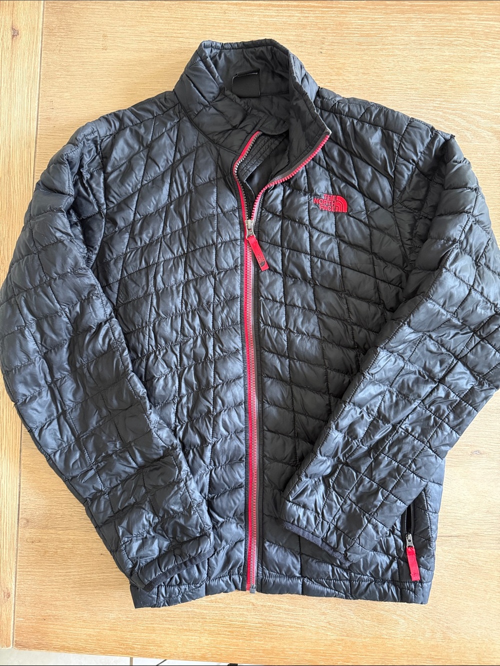 The North Face Black Quilted Packable Jacket with Red Trim